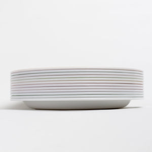 Fruit and vegetable plates stacked (nested) neatly